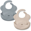 Set van 2 siliconen slabbetjes in beige en blauw, met geïntegreerde opvangbak voor minder vlekken.